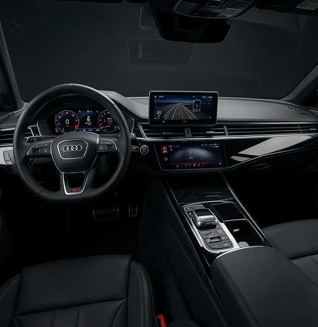 Audi Premium Sedan dashboard and front passenger cabin view